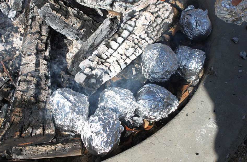 potatoes baking in the fire
